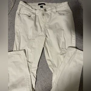 White distressed skinny jeans